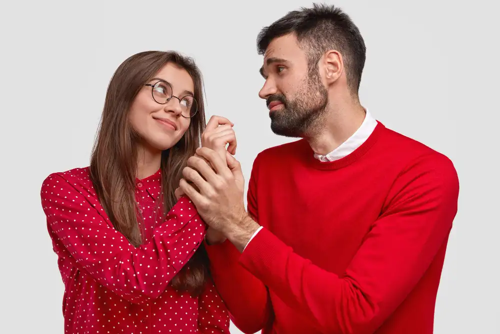 Long term couple looking into each other's eyes with quiet emotion and recognition after many years together