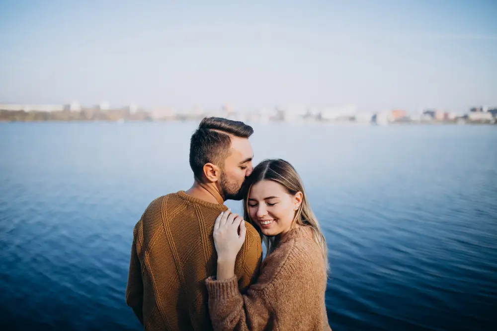 Long term couple walking together beside the sea, rediscovering each other and their connection