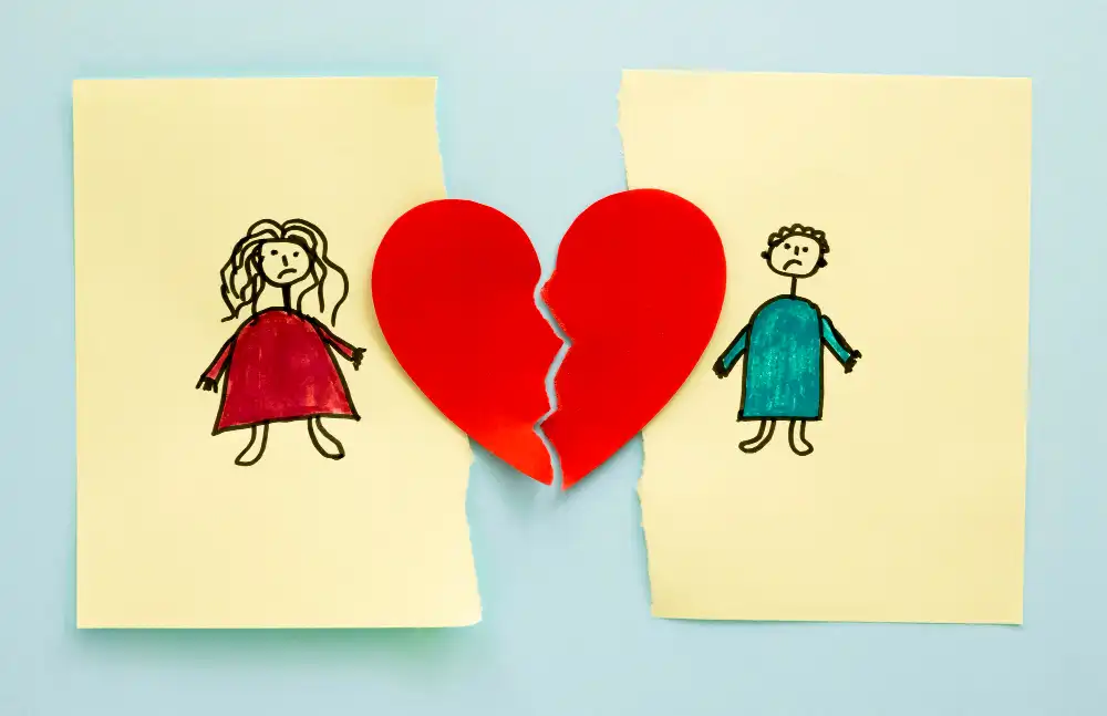 Heartbreak and distance drawn between a boy and girl, representing the pain of confusing lust and love