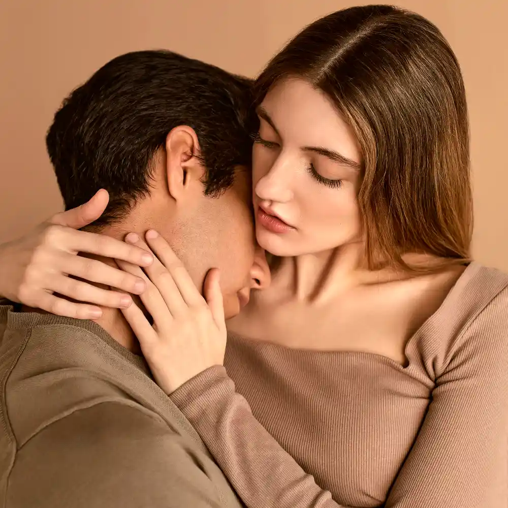 A couple sharing a passionate, intimate moment