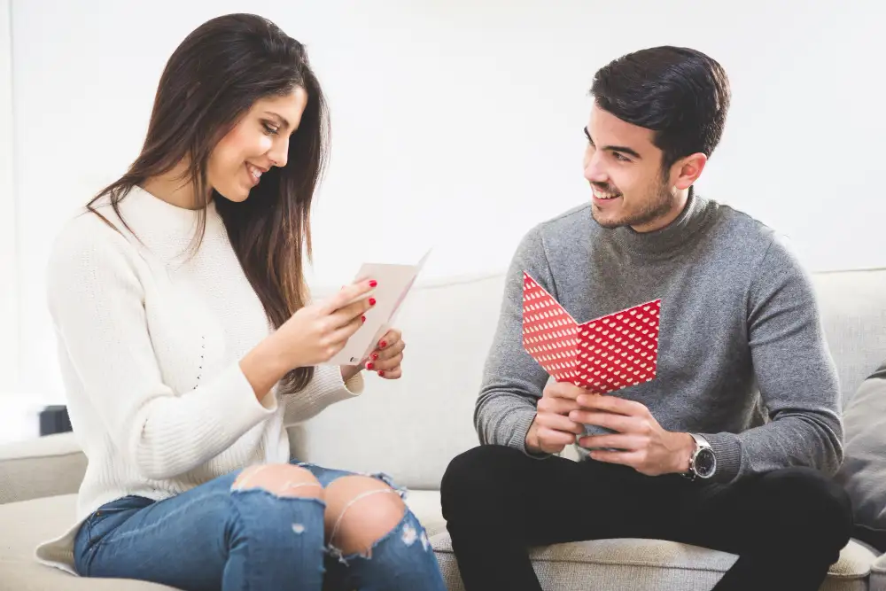 Couple genuinely smiling and connecting after meeting through a thoughtful dating app