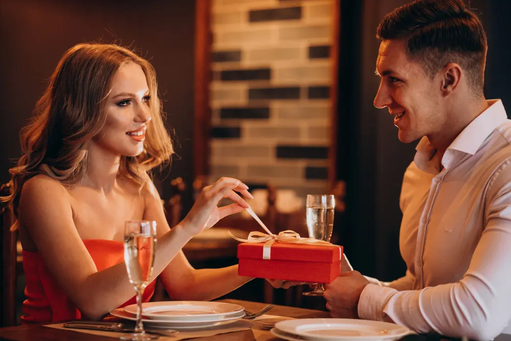 Couple enjoying a candlelit dinner date after meeting through a dating app